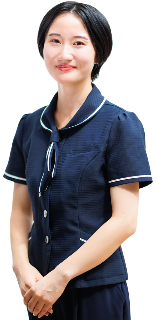 画像：笑顔のフロントスタッフ